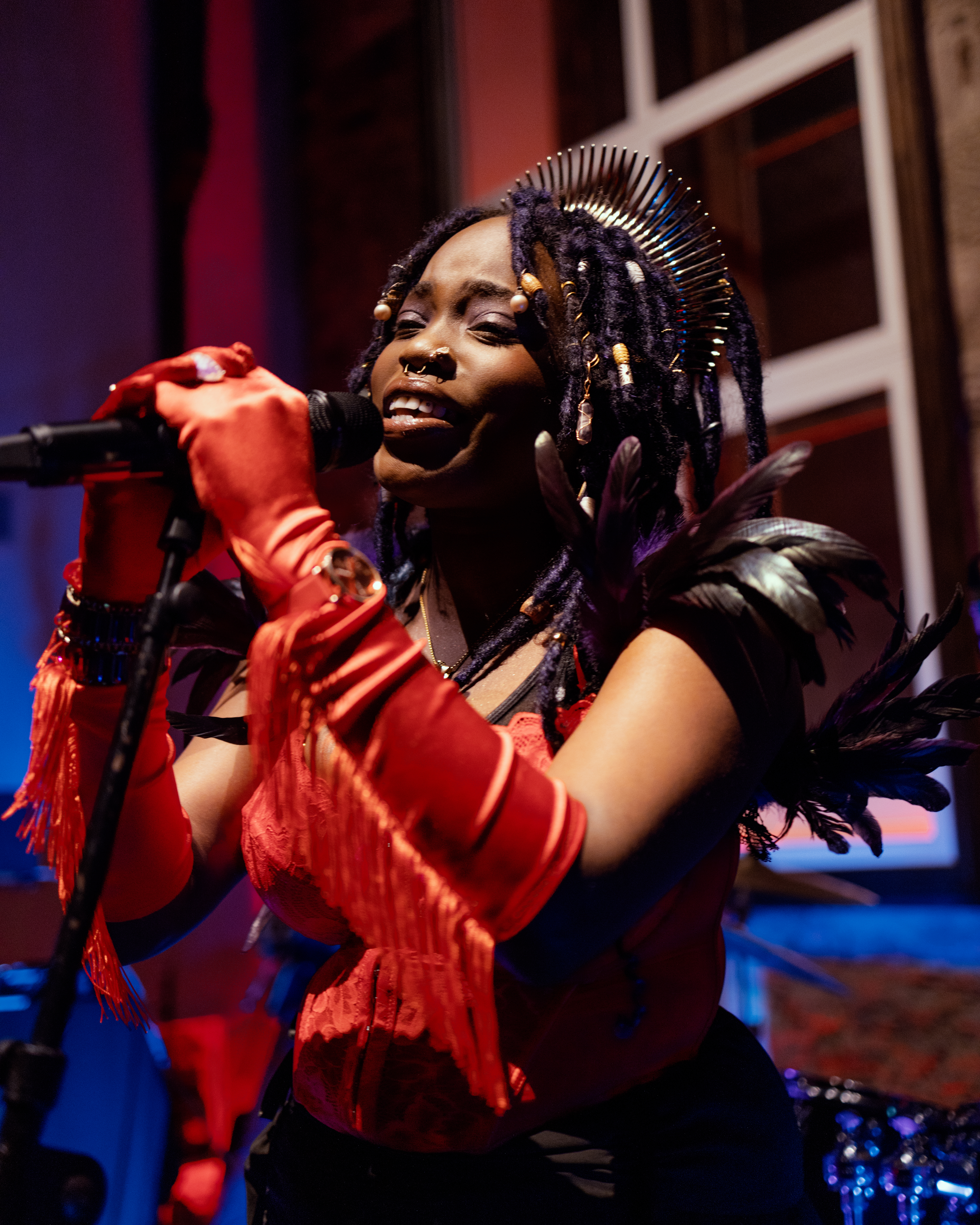 Be United photo of a young woman singing