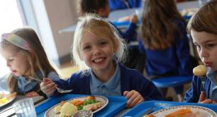 Children eating school meal provided by Edsential